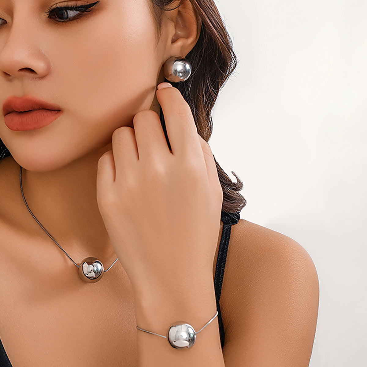 European and American Inspired Statement Necklace with Punk Snake Bone Chain and Geometric Ball Accent