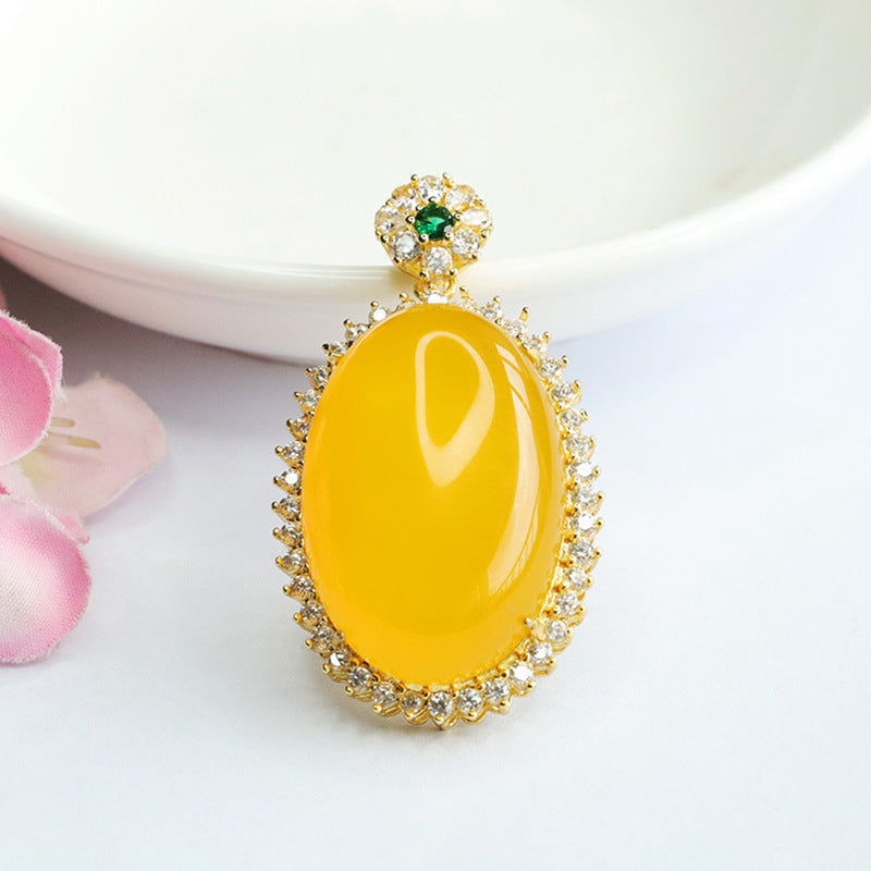 Golden Necklace with Chalcedony Pendant and Zircon Halo
