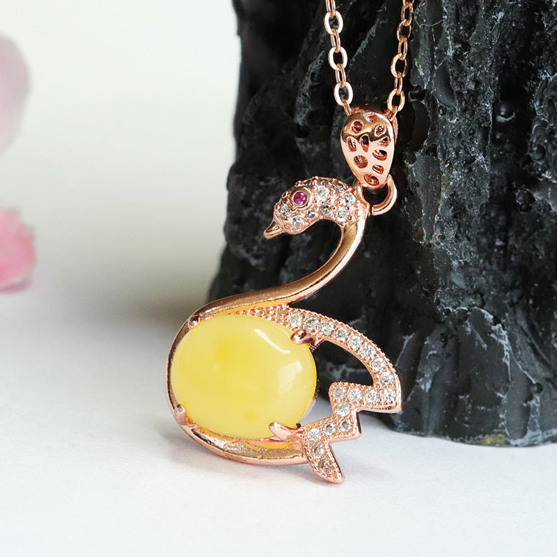 Swan Pendant Crafted from Sterling Silver with Beeswax Amber Gem