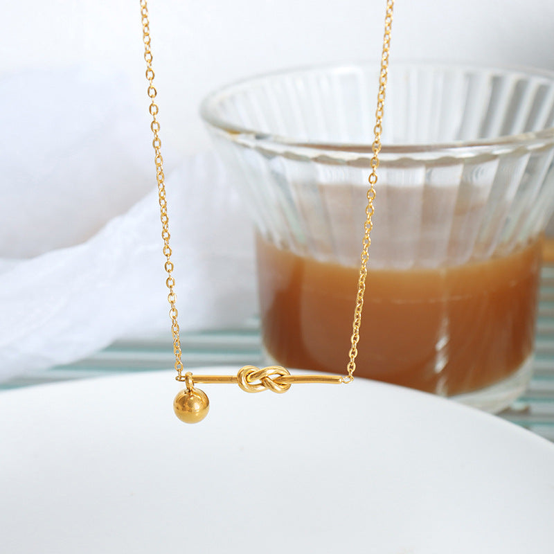 Golden Geometric Knot Pendant Necklace - Titanium Steel Jewelry for Women