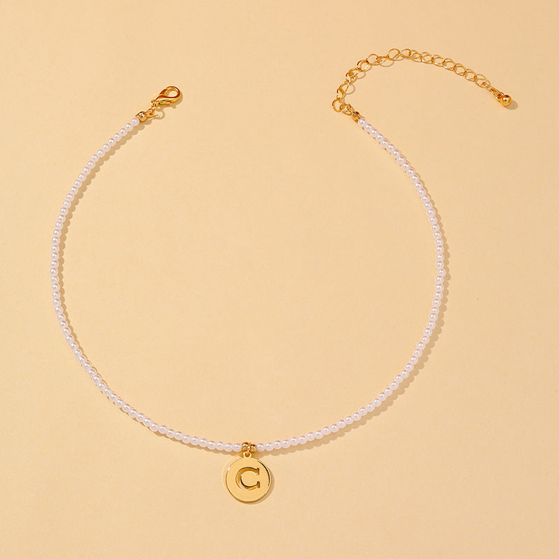Elegant Hollow English Letter Pendant Necklace with Pearl Accents