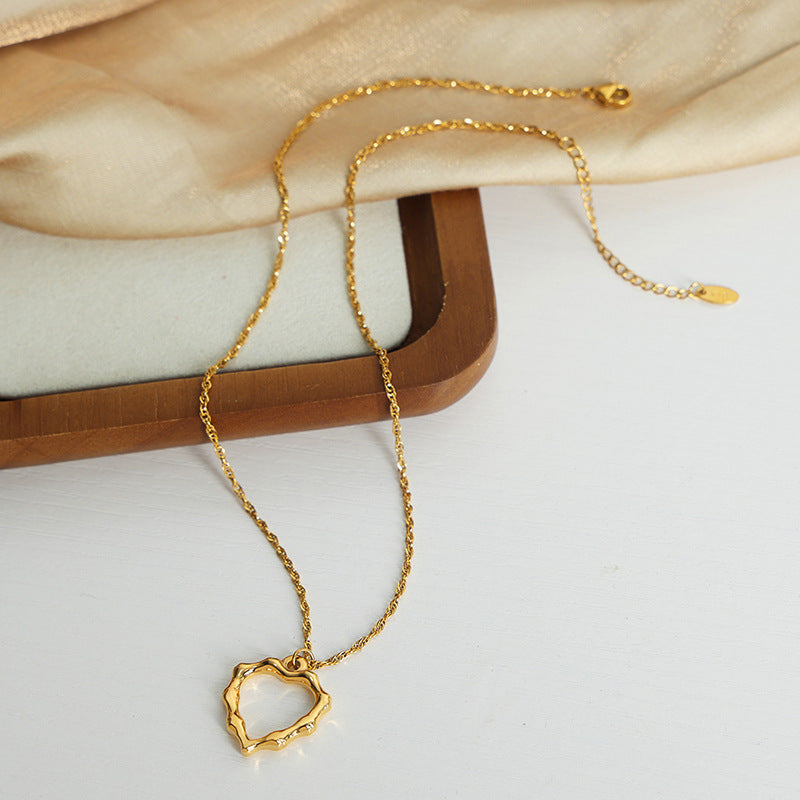 Niche Design Gold-Plated Pendant Necklace with Irregular Charm