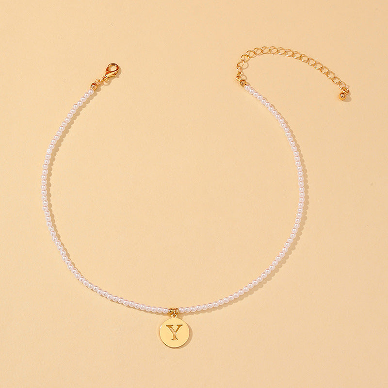 Elegant Hollow English Letter Pendant Necklace with Pearl Accents