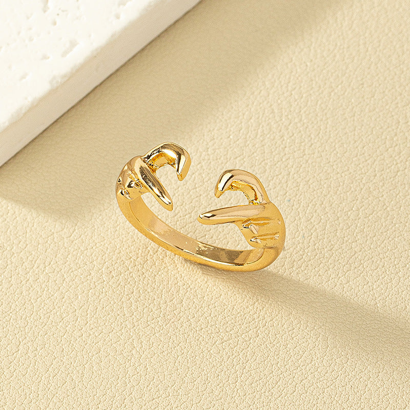 Vienna Verve: Chic Love Gesture Ring and Elegant Fashion Earrings Collection