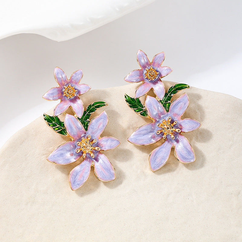 Planderful Vienna Verve Earrings – Fashionable Metal Color Dripping Flower Design