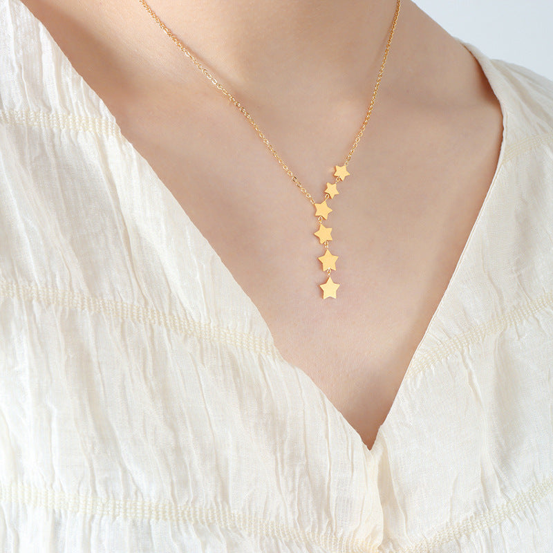 Whimsical Star Tassel Necklace with Fairy Charm