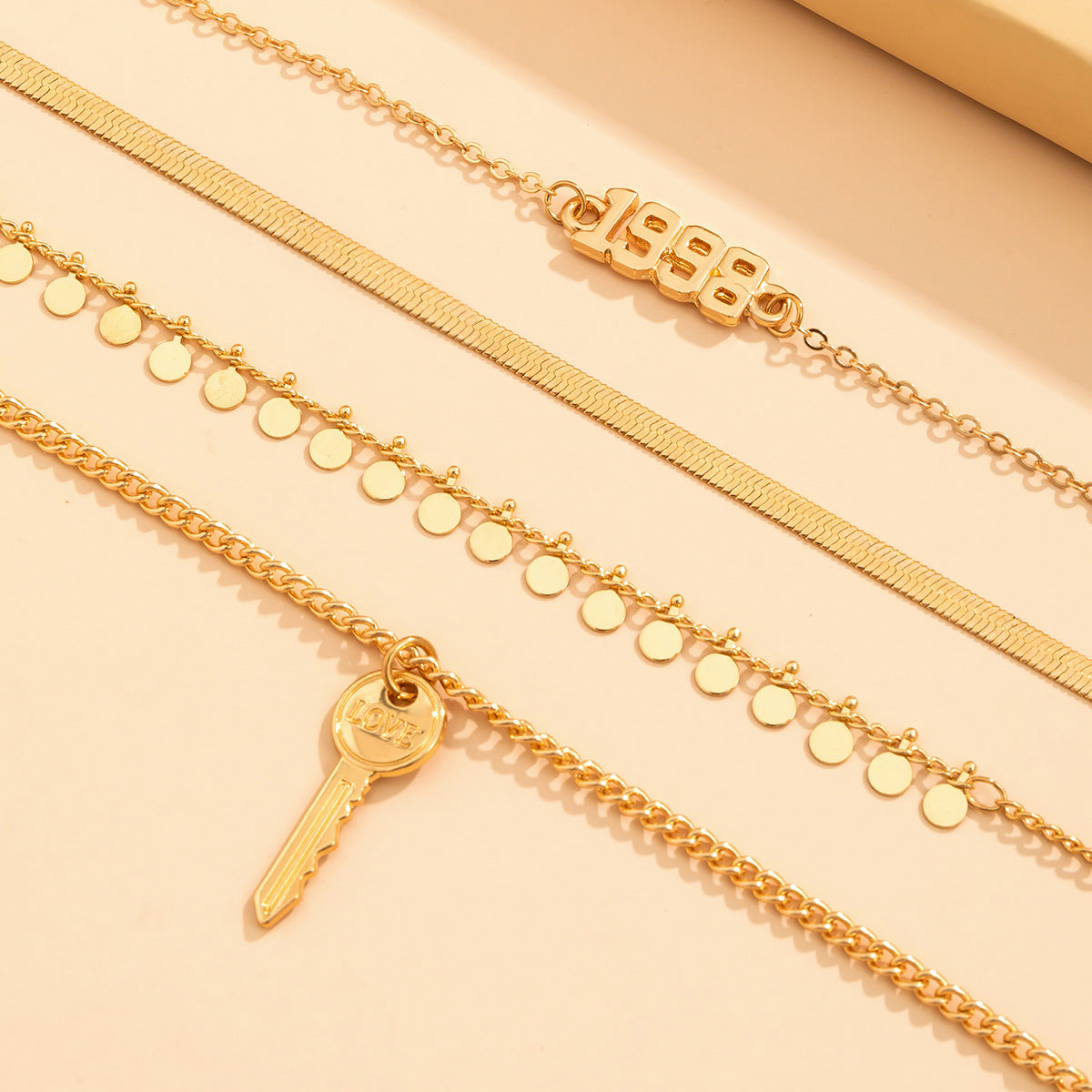 Planderful Vienna Verve Statement Necklace With Sequined Fringed Letter Key And Geometric Snake Bone Chain For Women