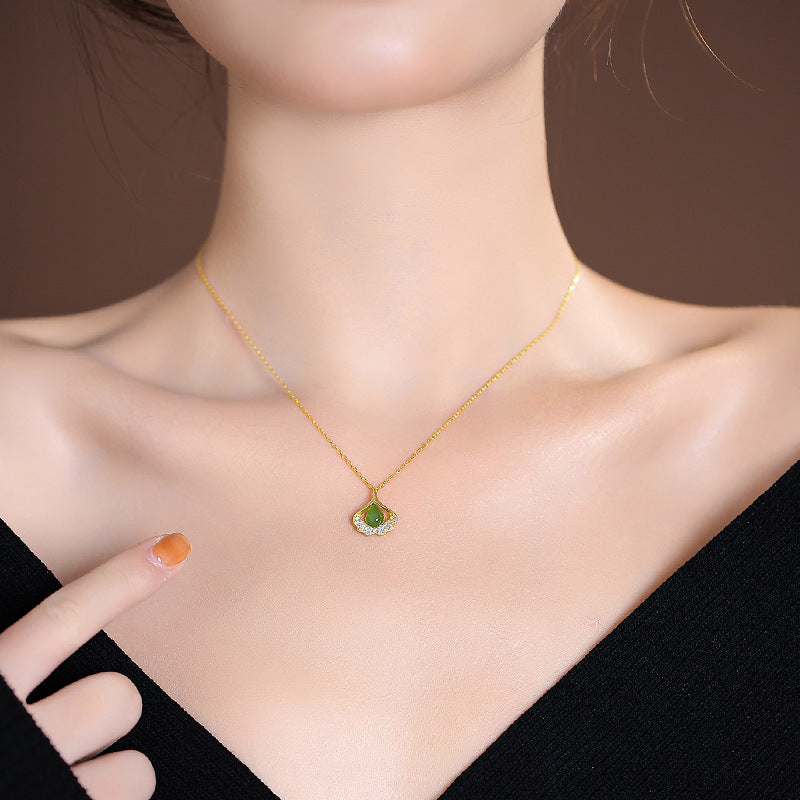 Luxurious Ginkgo Leaf Pendant Necklace with Hotan Jade and S925 Silver Chain