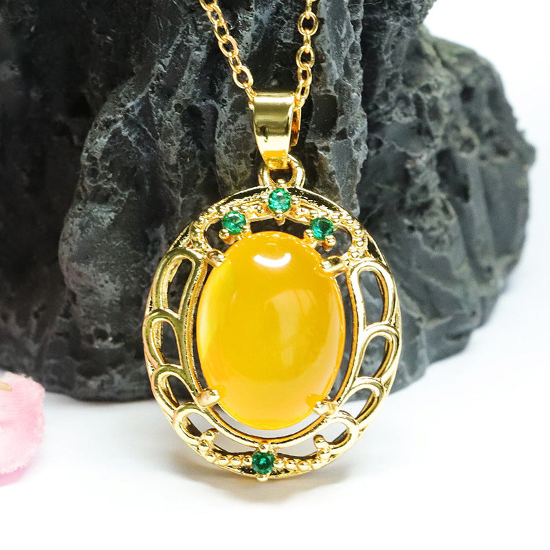 Oval Yellow Chalcedony Hollow Zircon Pendant