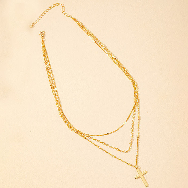 Fashionable Triple-Layer Cross Pendant Necklace with Korean Influence