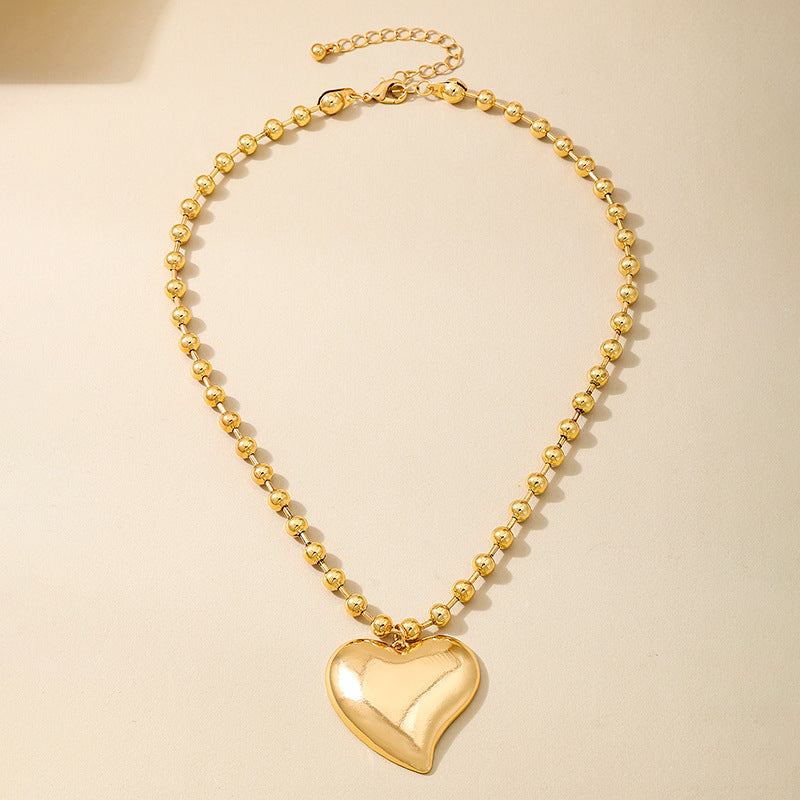 Planderful Vienna Verve Necklace – Stylish Retro Gold Round Bead Design