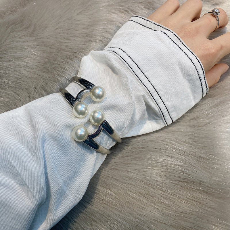 Mystique Pearl Bracelet - Exquisite Metal Bangle with Edgy Charm