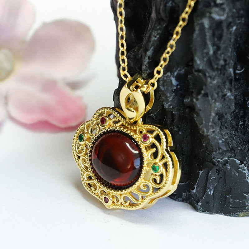 Blood Amber Ruyi Pendant with Sterling Silver Frame and Beeswax Gem