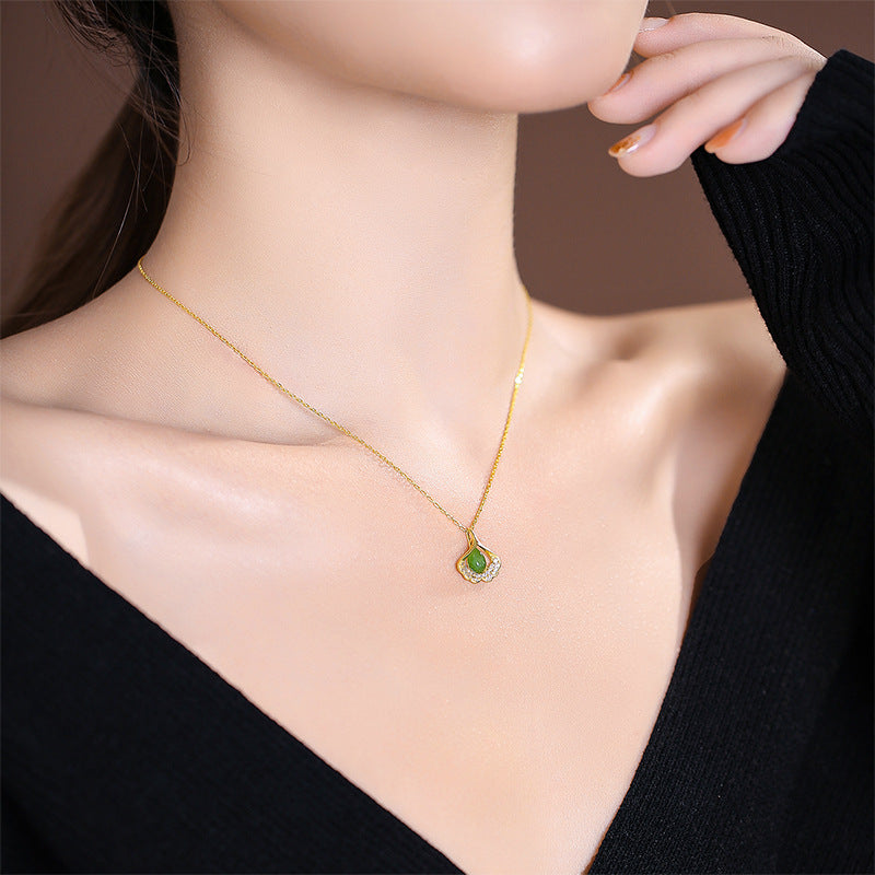 Luxurious Ginkgo Leaf Pendant Necklace with Hotan Jade and S925 Silver Chain