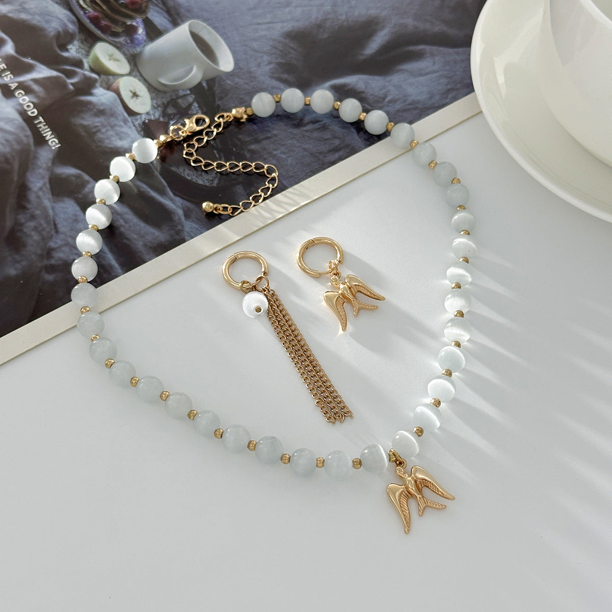 Planderful Vienna Verve Cat Eye Beaded Jewelry Set For Women Fringed Ear Buckle Earrings And Swallow Pendant Necklace