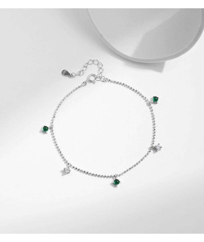 Elegant Sterling Silver Bracelet with Emerald Zircon Accent