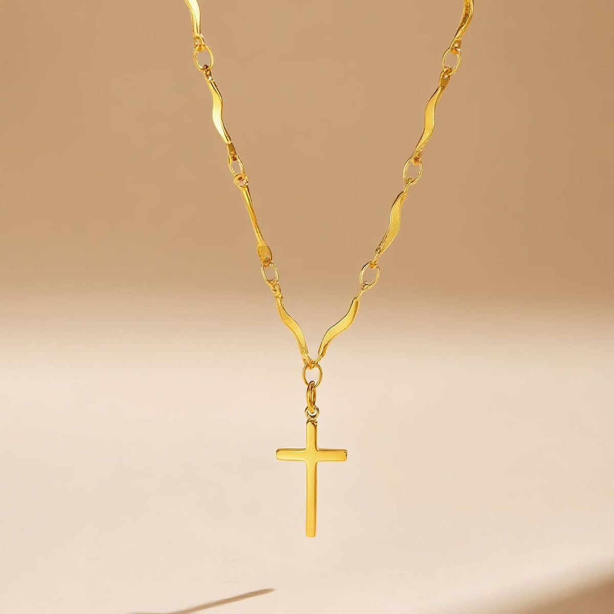 Delicate Gold Cross Necklace with Wavy Links