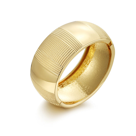 European Sensation Gold Ripple Bracelet - Stylish Wide Edge Spring Buckle Accent