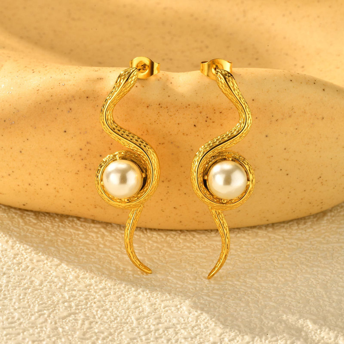 Gold-Tone Sculptural Pearl S-Curve Earrings