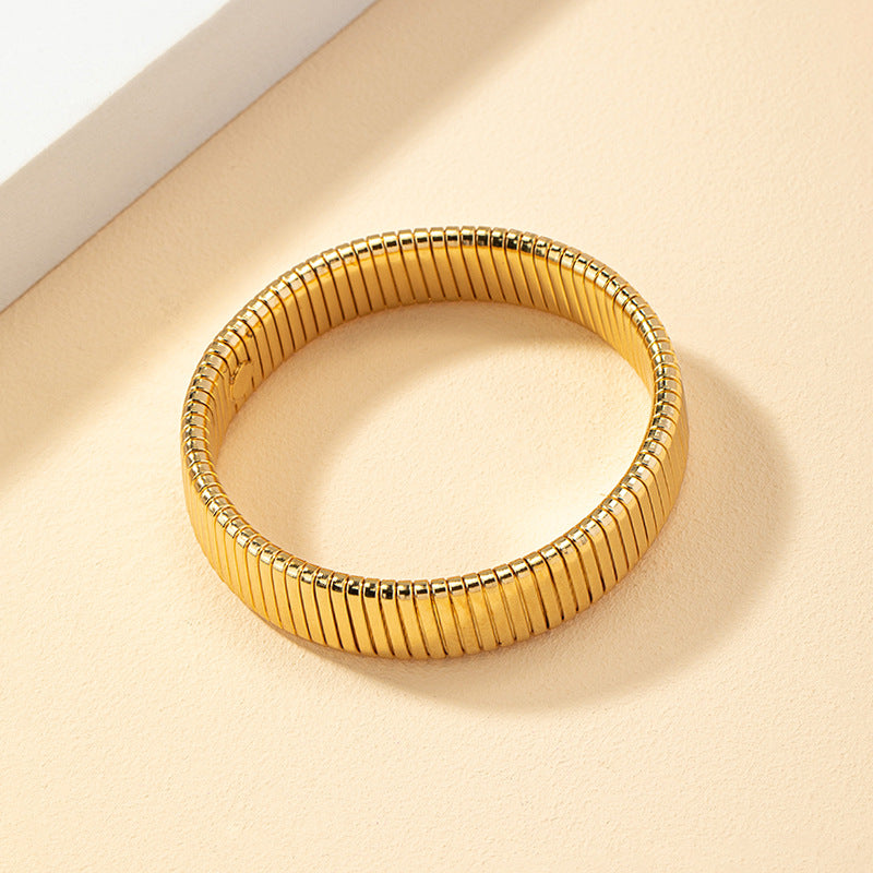 Golden Striped Bracelet with Vintage Appeal and Retro Charm