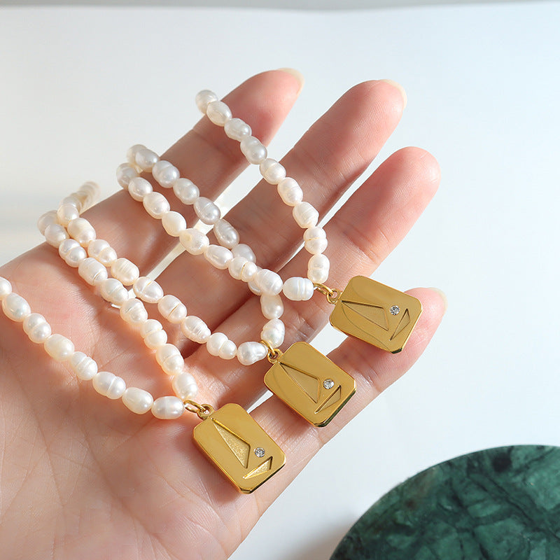 Luxury Irregular Pearl and Zircon Necklace with Titanium Steel Pendant