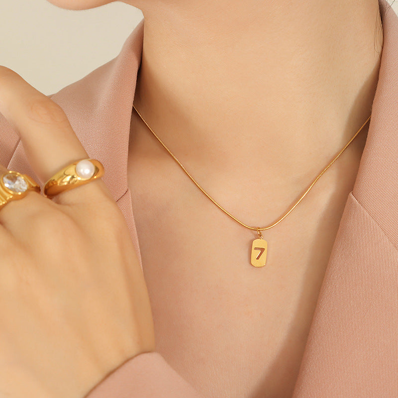 Lucky 7 Tag Snake Bone Chain Clavicle Necklace - Niche Design in Plated 18K Gold, European and American Style