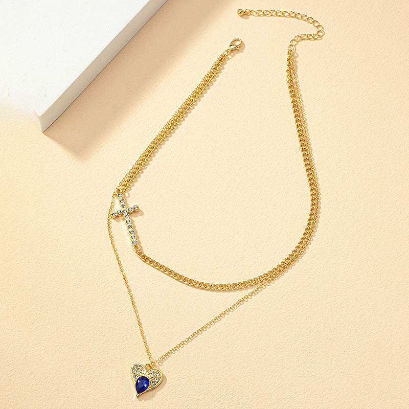 Elegant Double Strand Necklace with Cross Pendant