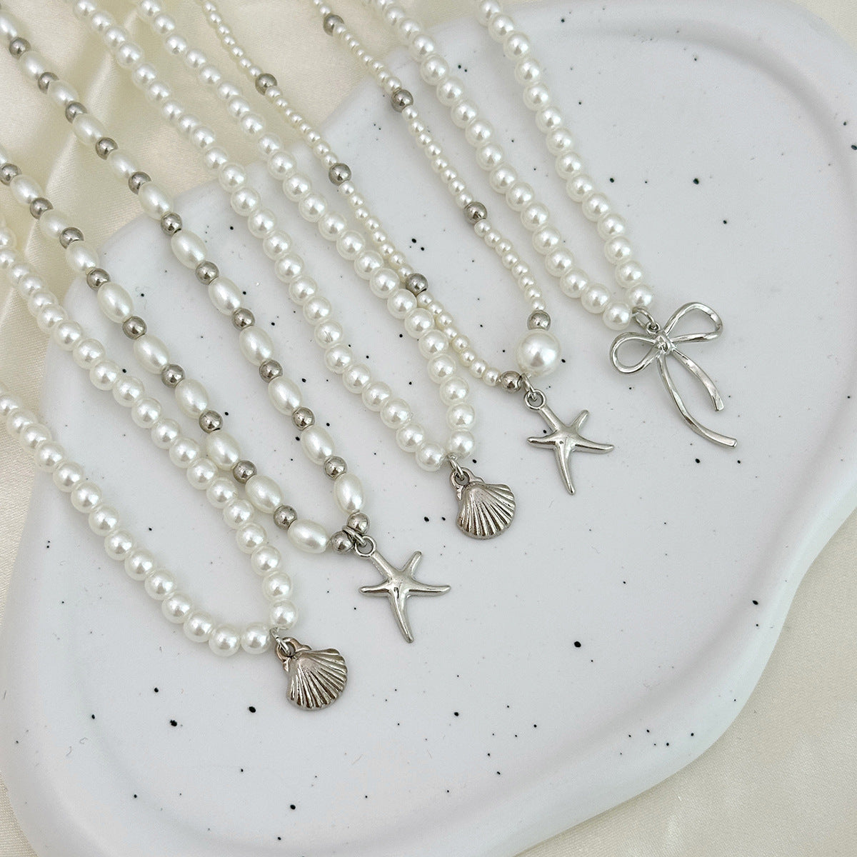 Pearl-Style Starfish & Bow Layered Necklace