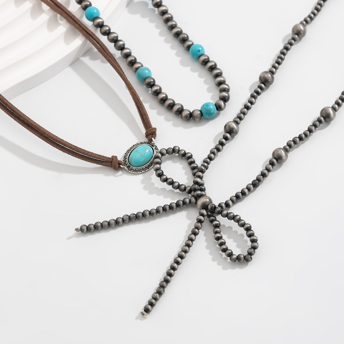 Planderful Vienna Verve Necklace – Handmade Ethnic Turquoise Bow Design