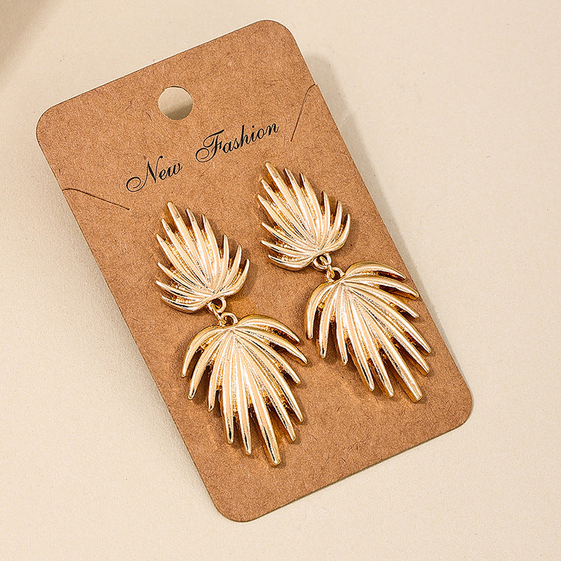 Exaggerated Fan-Shaped Tassel Earrings with Retro Maple Leaf Design