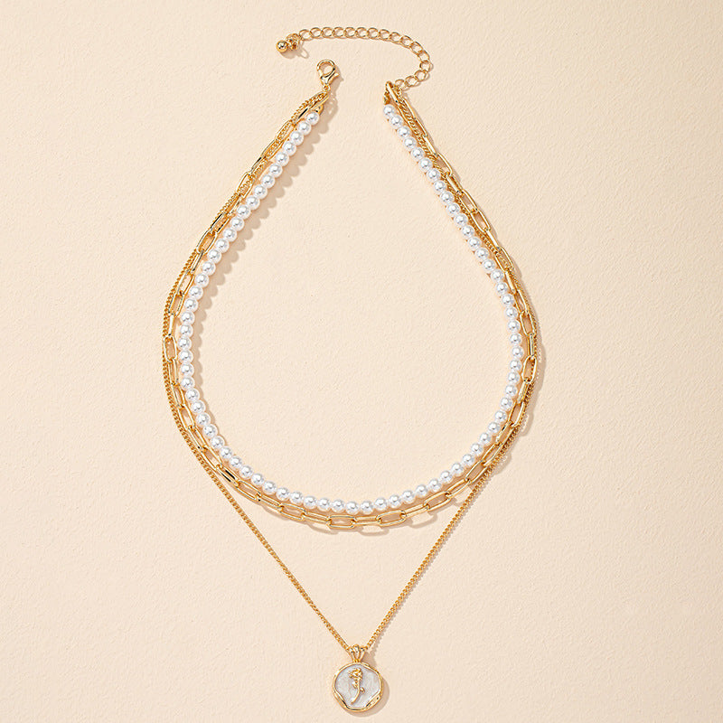 Elegant Pearl Layered Necklace with Floral Tag - Vienna Verve Collection