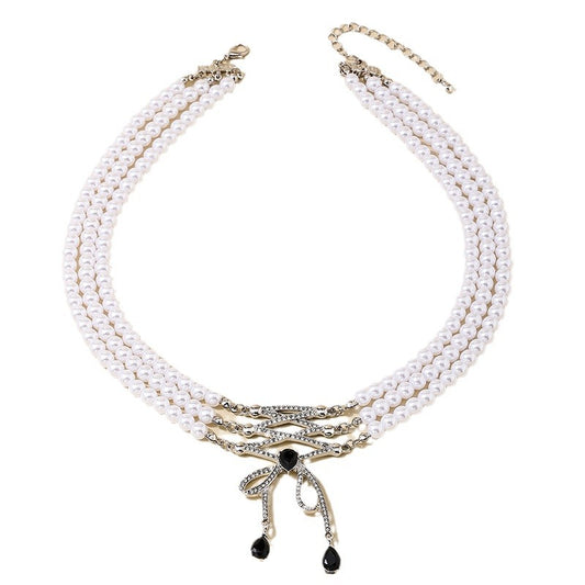 Extravagant Bow Tassel Pendant Pearl Necklace with Retro Flair
