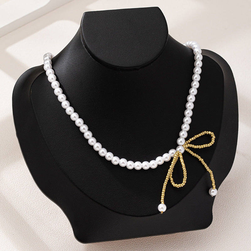 Planderful Vienna Verve Necklace – Exquisite Imitation Pearl Bow Design