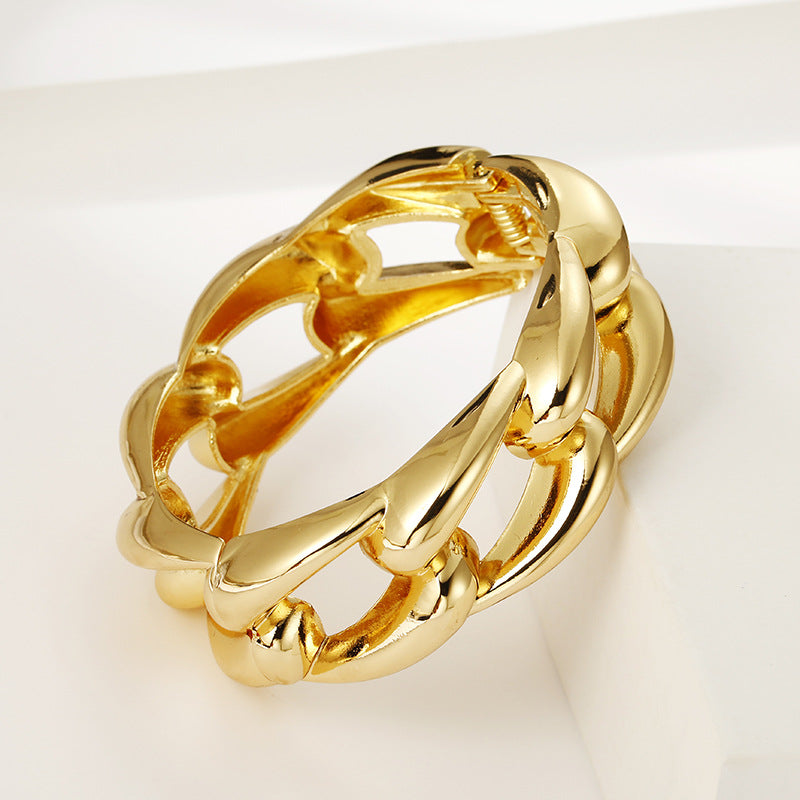 Golden Charm Bracelet with Unique Chain Design
