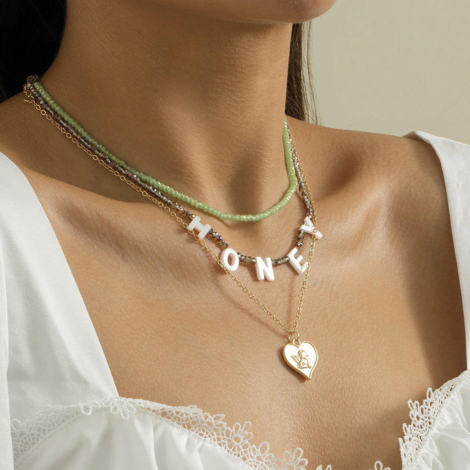 Honey Letter Necklace Stacked Portrait Beaded Heart By Planderful Vienna Verve For Women Chic Statement Jewelry