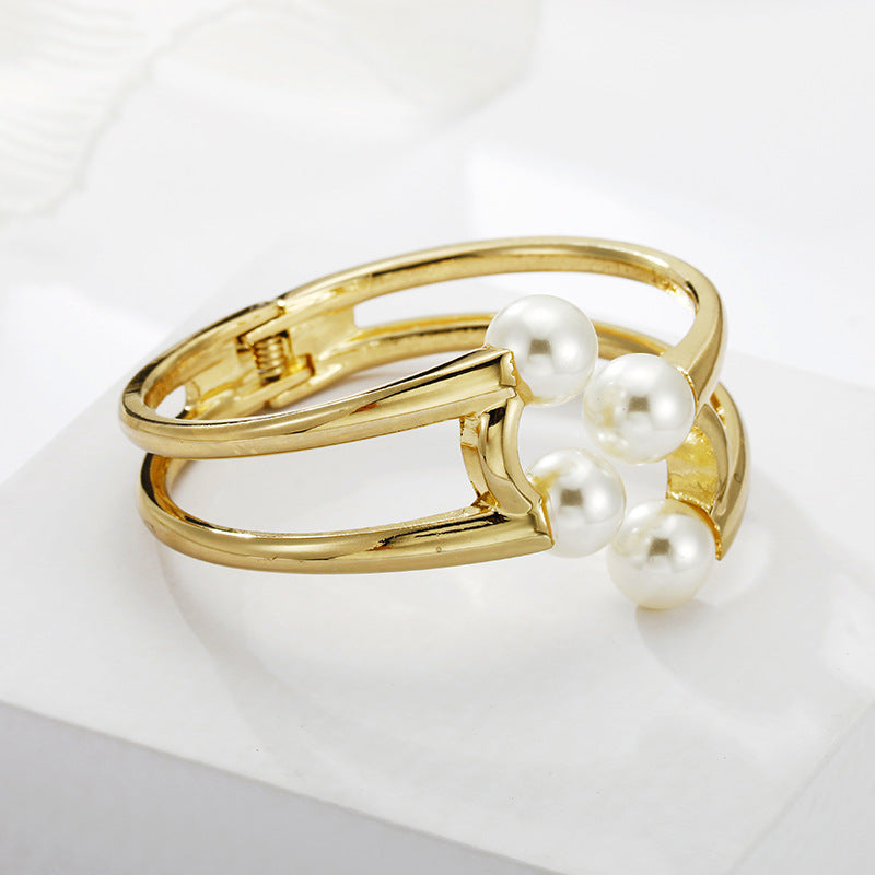 Mystique Pearl Bracelet - Exquisite Metal Bangle with Edgy Charm
