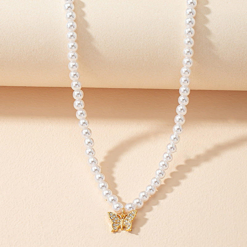 Luxurious Butterfly Pendant Necklace with Pearl Embellishments