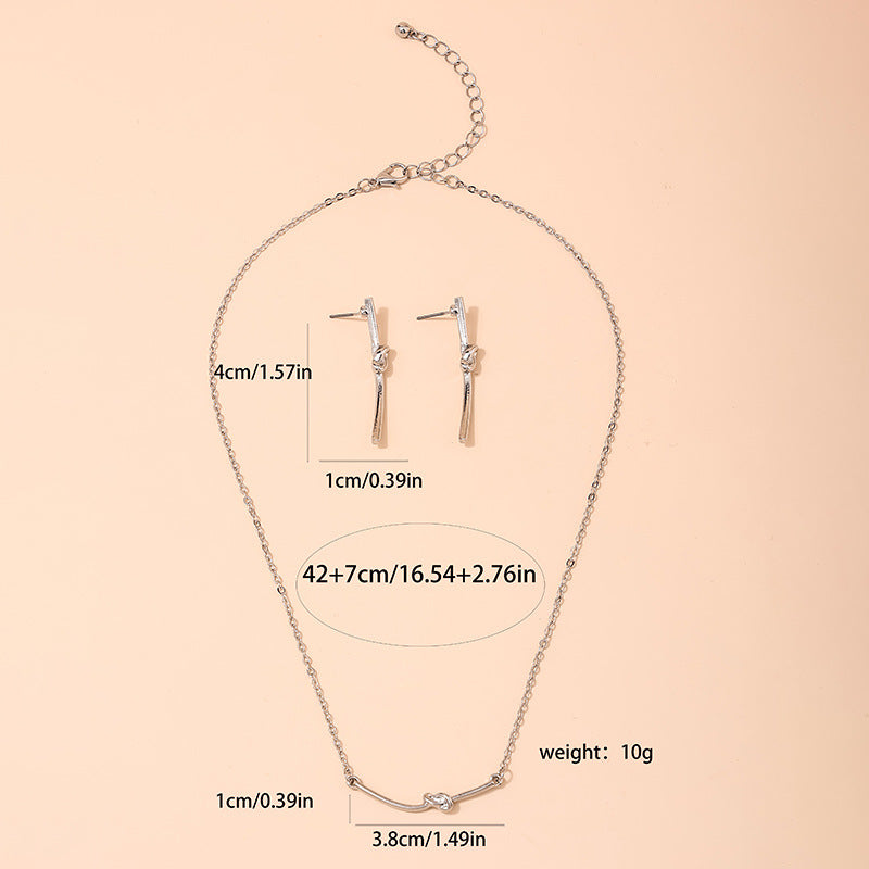 Fashionable Vienna Verve Metal Necklace and Earrings Set with Unique Knot Design