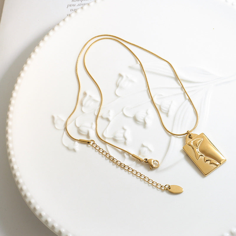 Golden Half-Face Portrait Pendant Necklace with Titanium Plating - European and American Jewelry Trend