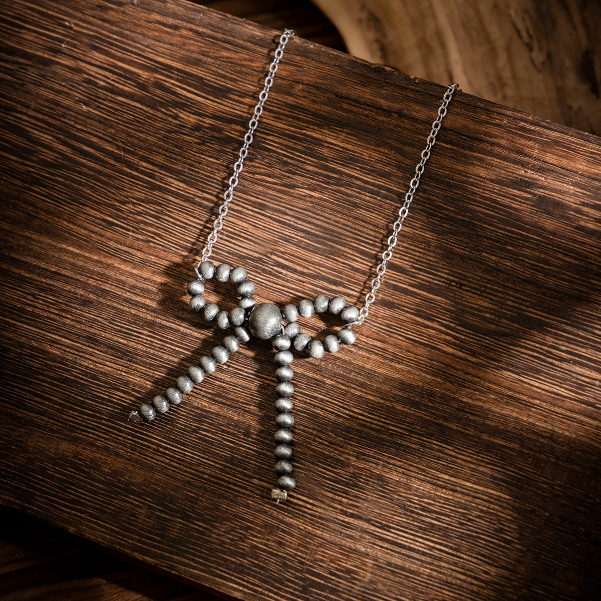 Planderful Vienna Verve Necklace – Retro Bow Pendant Design