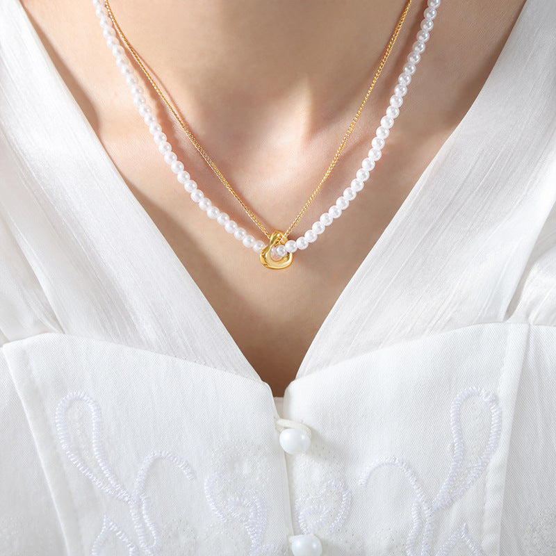 Elegant Handcrafted Pearl Necklace with Retro Charm and Gold Plating