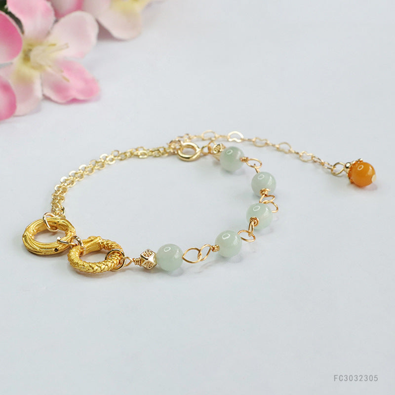 Jadeite Dragon & Phoenix Round Bead Bracelet