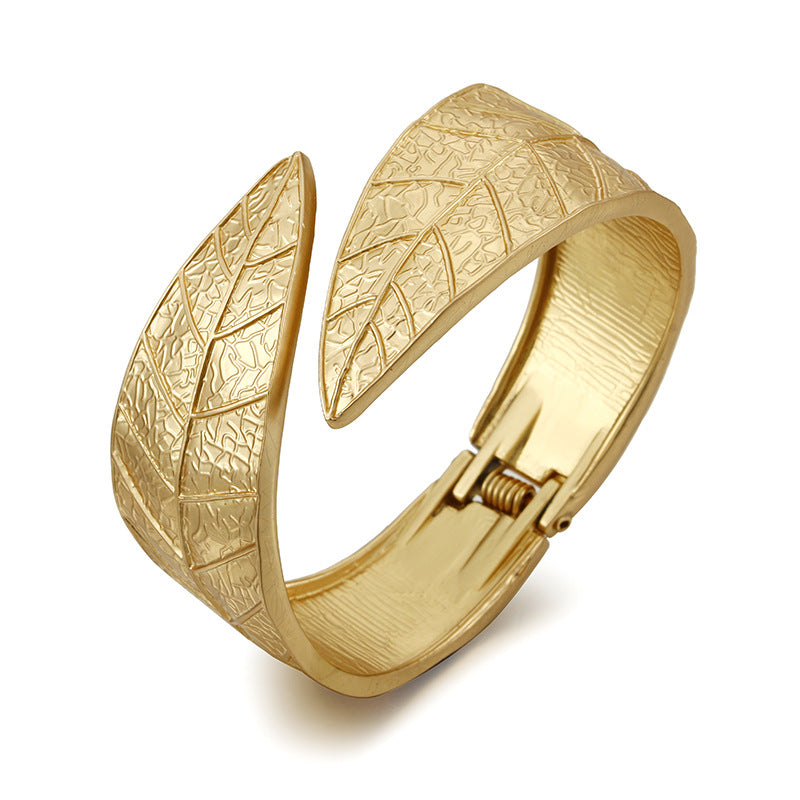 Vienna Verve Exaggerated Silver Bracelet with Leaf Design