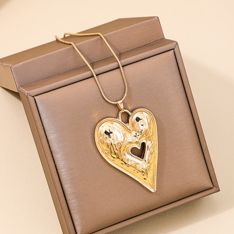 Exaggerated Love Symbol Sweater Chain Necklace with Hollow Pendant