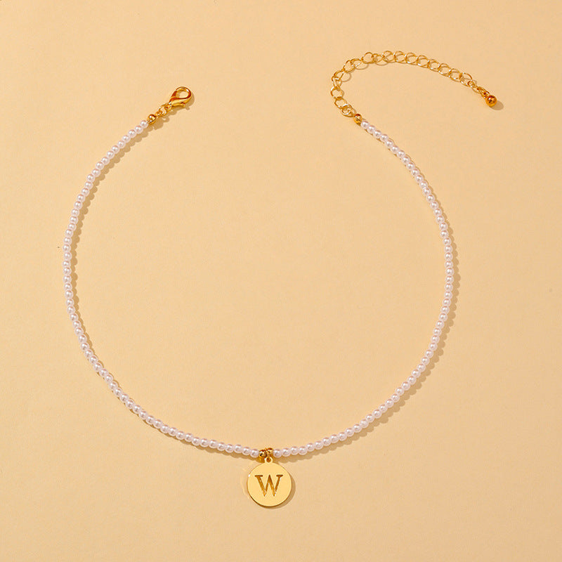 Elegant Hollow English Letter Pendant Necklace with Pearl Accents