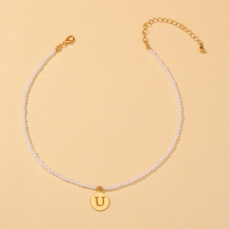 Elegant Hollow English Letter Pendant Necklace with Pearl Accents