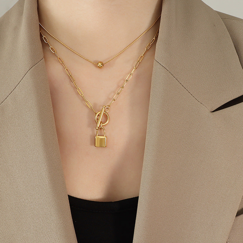 Cold and Chic Titanium Steel Necklace with OT Buckle and Steel Ball Pendant