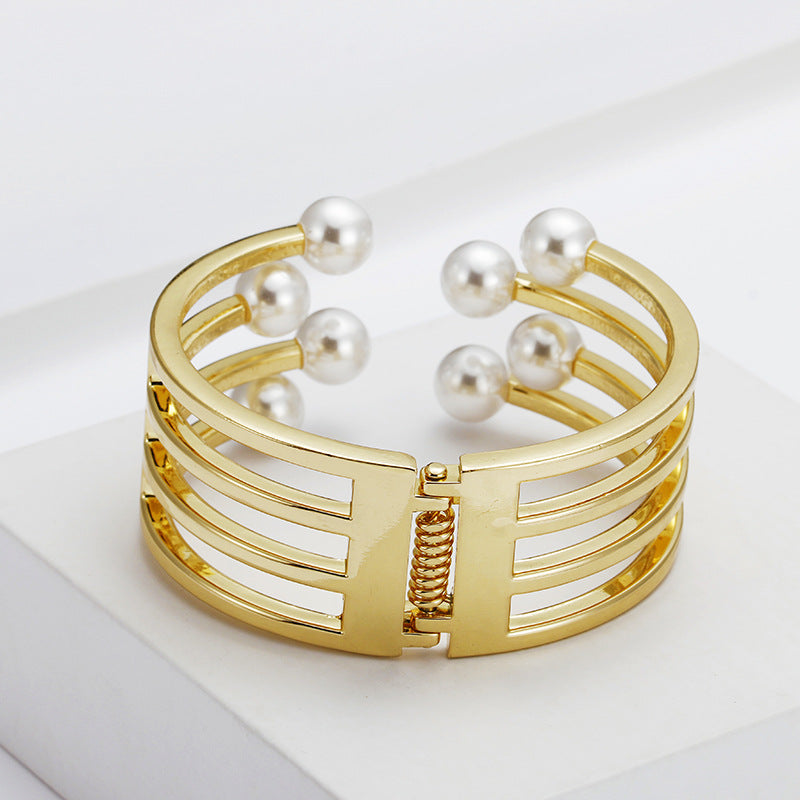 Fragrant Essence Gold Metal Bracelet with Delicate Openwork Design