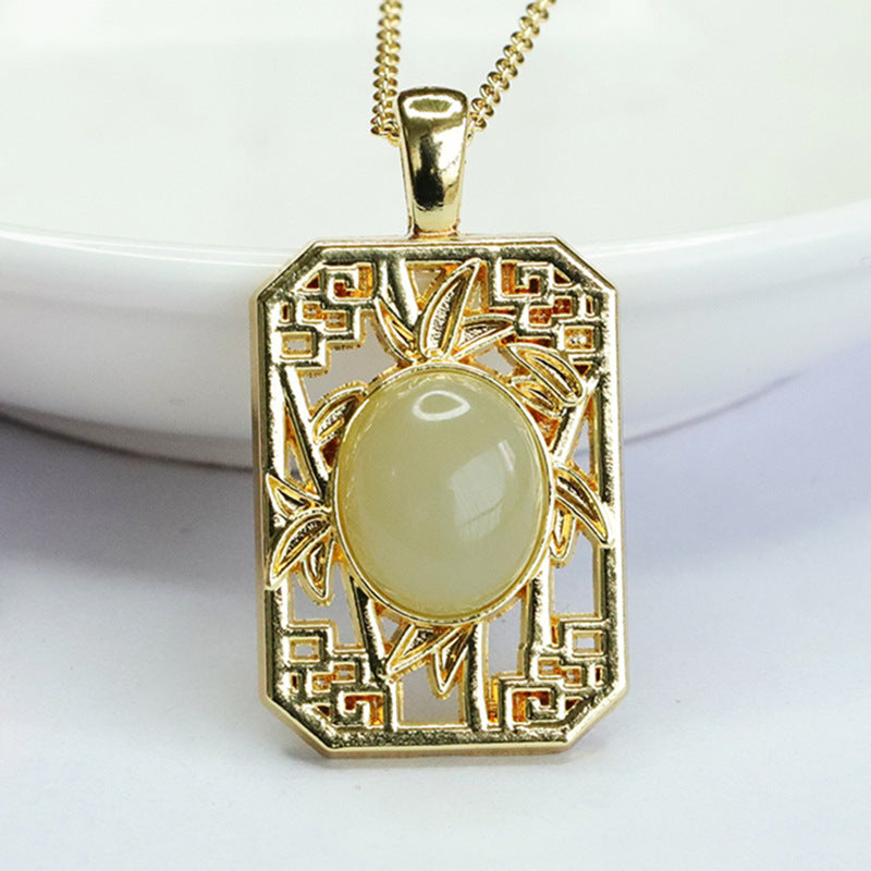 Bamboo Hollow Sterling Silver Pendant with Hotan Jade