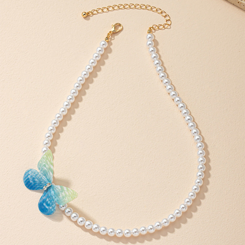 Butterfly Embroidered Neckpiece with Niche Design